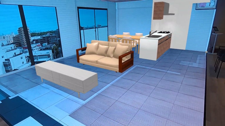 VRモデルルーム上にMRを用いて3D家具を投影した様子